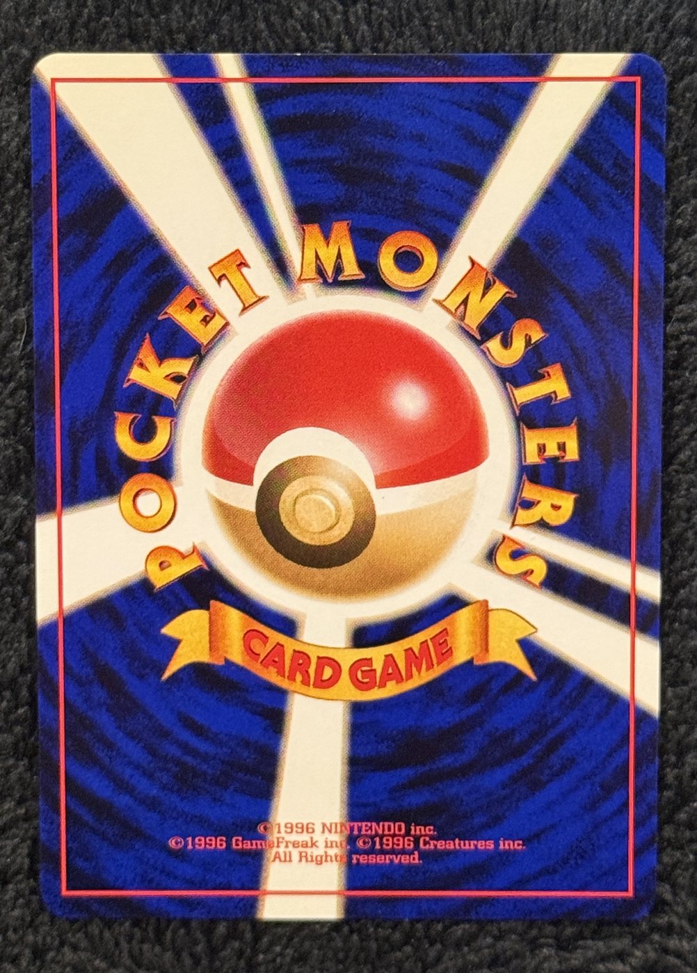 Charizard, verso da carta