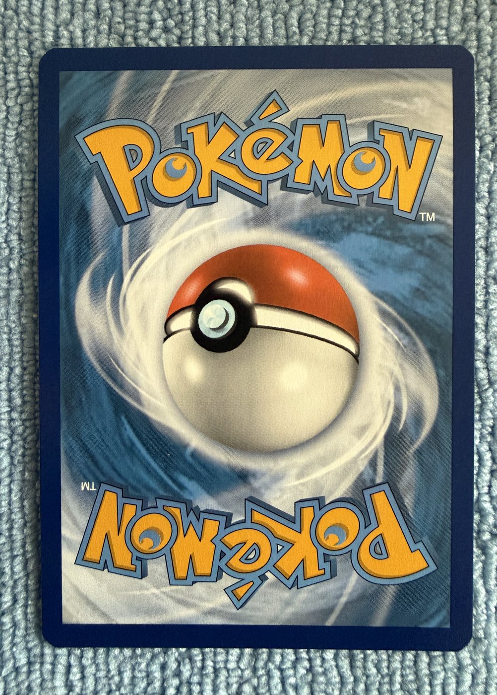 Charizard, verso da carta